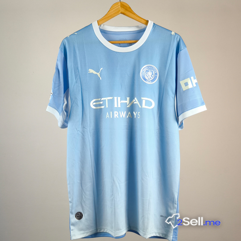 Prima Maglia Manchester City 26/27 Haaland (Versione Fan) - Taglia L